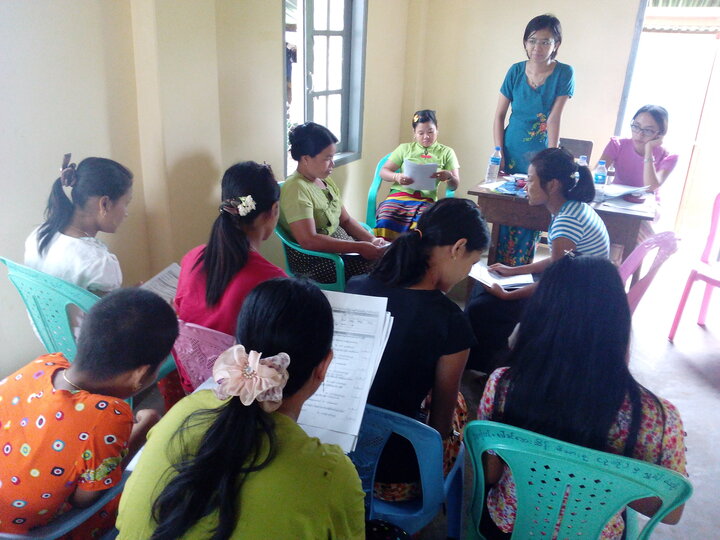 Community volunteers practice questionnaires during training session – Yangon region, Myanmar