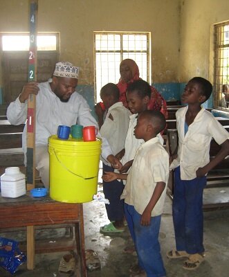 School-children receiving Praziquantel and albendazole treatment. Image copyright: Steffi Knopp