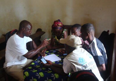 Training community health workers to use smartphones for data collection. Image courtesy LASER, LSHTM